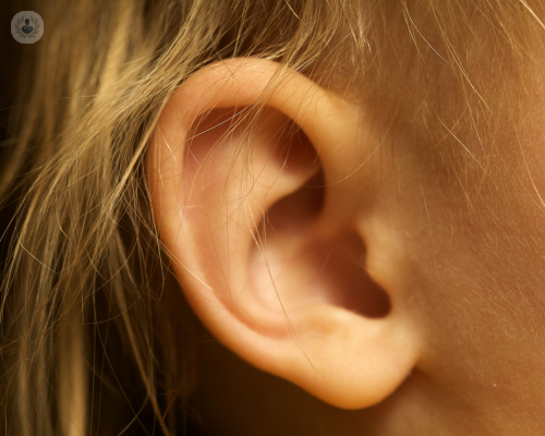 Osseointegrated implants and ear microsurgery to recover hearing loss