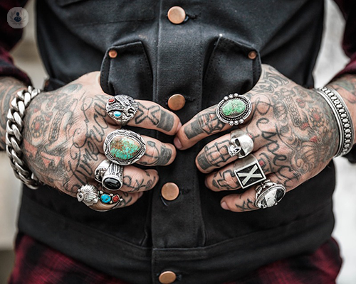 Illinois Man's Finger Tattoos Go Viral For All the Right Reasons